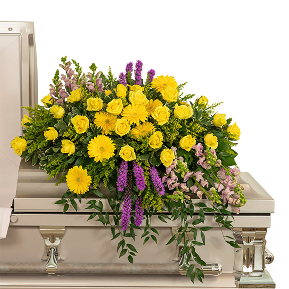 Sunshine from Heaven Casket Spray – PETERSEN & TIETZ FLORISTS & GREENHOUSES, Waterloo IA