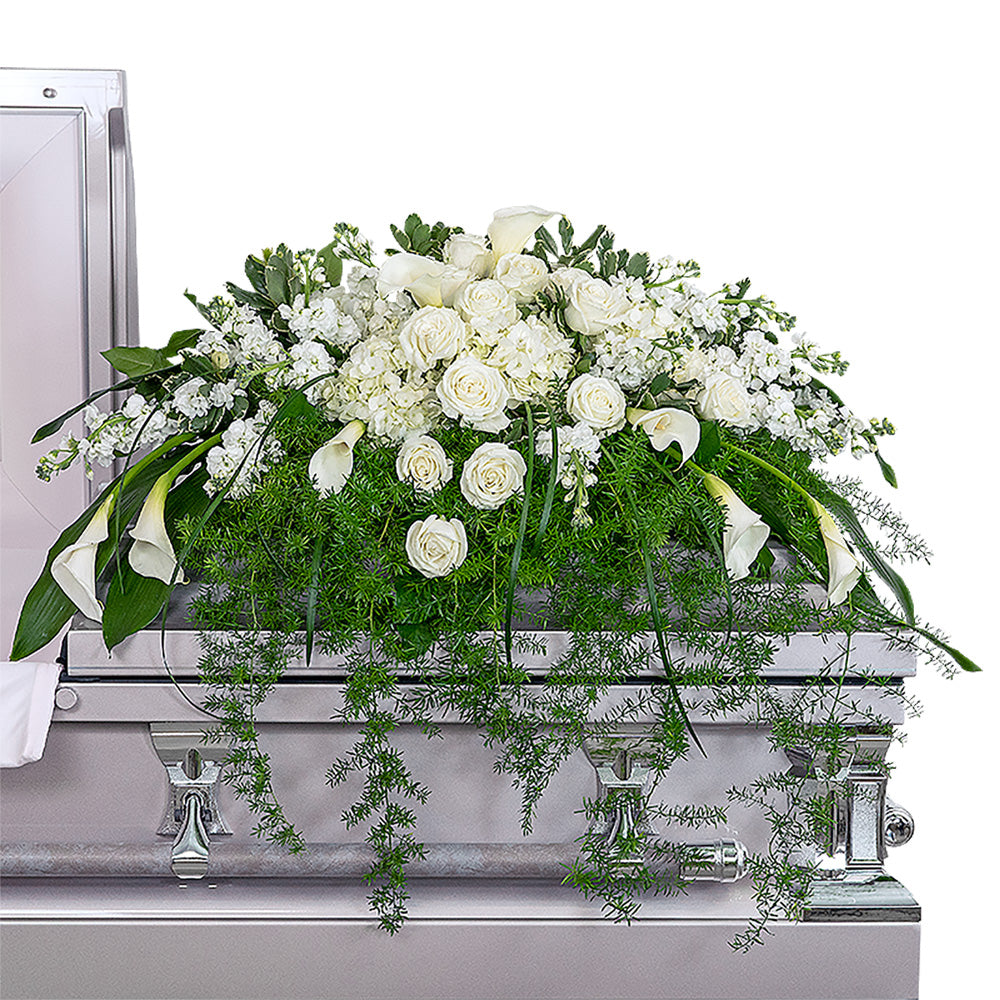 Eternal Peace Casket Spray – PETERSEN & TIETZ FLORISTS & GREENHOUSES, Waterloo IA