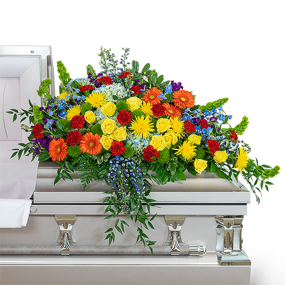 Vibrant Life Casket Spray – PETERSEN & TIETZ FLORISTS & GREENHOUSES, Waterloo IA