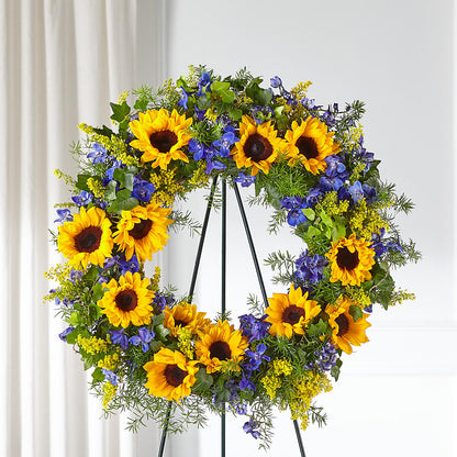 Bright Rays Wreath – PETERSEN & TIETZ FLORISTS & GREENHOUSES, Waterloo IA