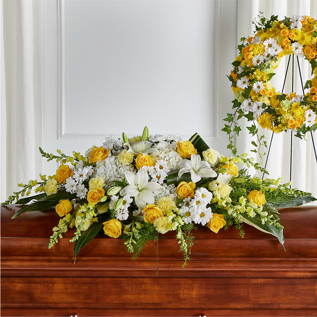 Golden Harmony Casket Spray – PETERSEN & TIETZ FLORISTS & GREENHOUSES, Waterloo IA